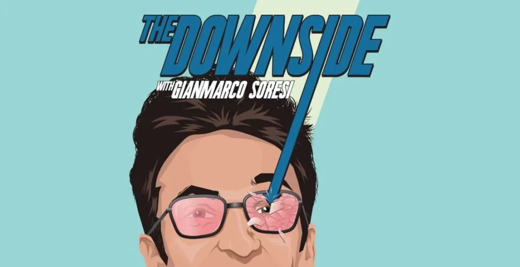 Gianmarco Soresi and Russell Daniels behind mics during a recording of The Downside, now on the Headgum network