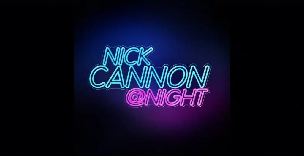 Cover art of Nick Cannon @ Night podcast series featuring Nick Cannon in a late-night studio setting with vibrant lights and guest chairs.